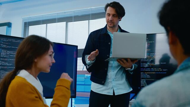 Diverse creative team of programmer develop ai assistant project together.Software engineer brainstorm about brain android robot,coding language,designer,artificial virtual intelligence with big data