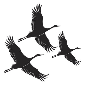 Three black silhouettes of cranes flying