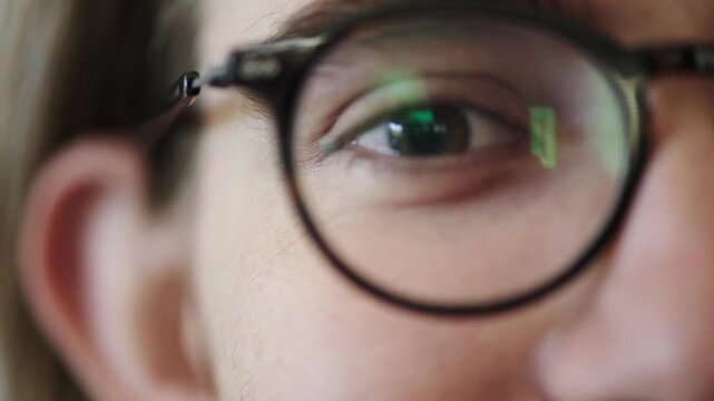 Optometry, face or eyes with glasses at clinic, eyesight correction or prescription lenses for myopia. Frame testing, eye exam or man with specs for vision improvement, ophthalmology or ocular health