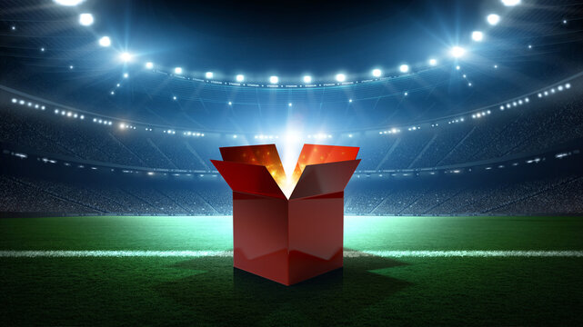 An open glowing red gift box on a soccer stadium field at night. An imaginary soccer stadium is modelled and rendered.