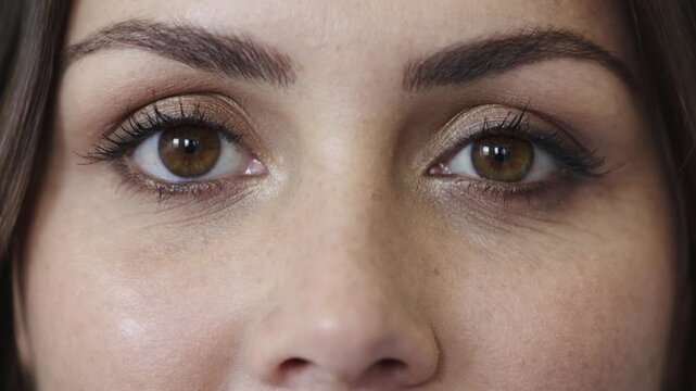 Face, eyes or woman with optometry at clinic, vision assessment or contact lenses for visual correction. Eye care, portrait or person with myopia check for optical wellness, eyesight test or blink