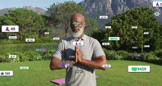 Wellness coach praying purple-mat badges emerging at edges gathering around him, showing growth