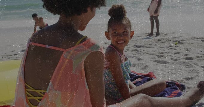 Left child on beach talking, wrapping younger for comfort, ball icons circling them showing health