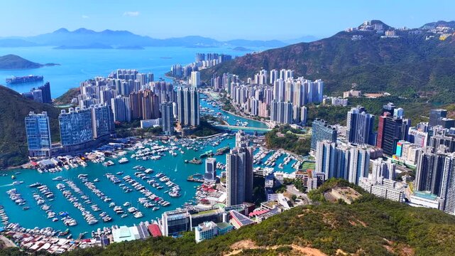Aerial footage of Hong Kong southern coastline showcases natural stone forests amid urban landscapes at Pok Fu Lam, Aberdeen, Wong Chuk Hang, Ap Lei Chau, Lei Tung, Deep Water Bay, and Shouson Hill