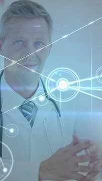 Vertical video: HUD expanding, doctor entering, reviewing records while medical spine HUD crossing