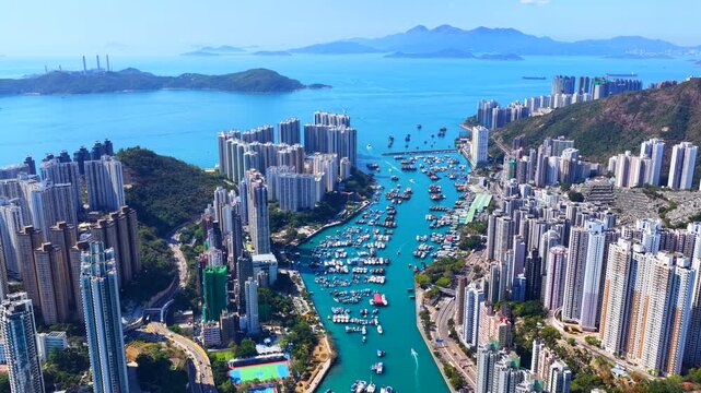 Aerial footage of Hong Kong southern coastline showcases natural stone forests amid urban landscapes at Pok Fu Lam, Aberdeen, Wong Chuk Hang, Ap Lei Chau, Lei Tung, Deep Water Bay, and Shouson Hill