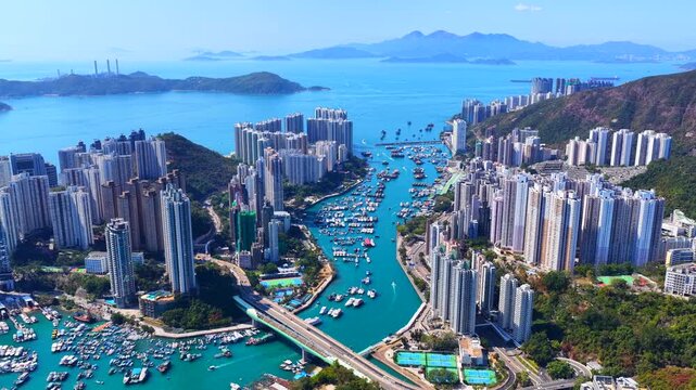 Aerial footage of Hong Kong southern coastline showcases natural stone forests amid urban landscapes at Pok Fu Lam, Aberdeen, Wong Chuk Hang, Ap Lei Chau, Lei Tung, Deep Water Bay, and Shouson Hill