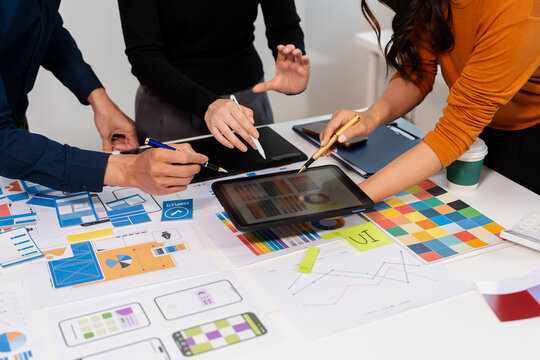 UX developer and ui designer brainstorming about mobile app interface wireframe design with customer breif and color code, User experience concept.