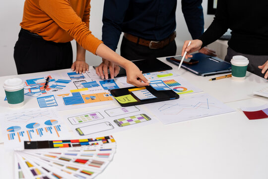 UX developer and ui designer brainstorming about mobile app interface wireframe design with customer breif and color code, User experience concept.