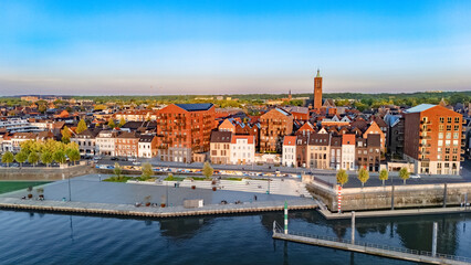 Obraz premium Venlo town cityscape, marina and waterfront near Meuse river aerial drone view, Venlo bird’s view on sunny weather, Limburg, the Netherlands