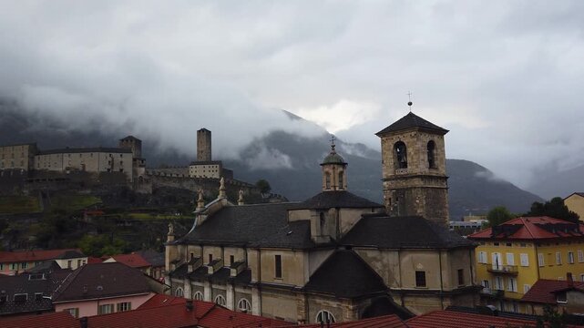 Bellinzona Castle Skyline in Misty Autumn Morning with Historic Fortifications Switzerland Landscape