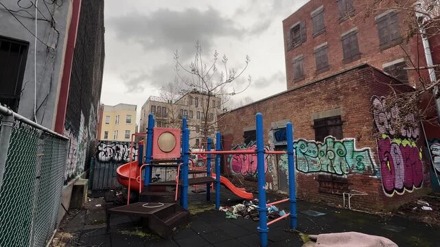 Urban playground with graffiti, Bushwick, Brooklyn on a cloudy day