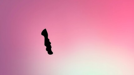 Fototapeta premium minimalist black silhouette profile on gradient pink background