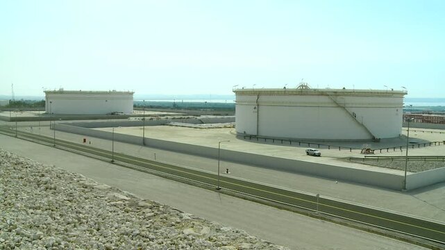 Two big gas tanks near the shore at Asalouyeh, Iran. Asalouyeh is the onshore location for the phased development of Iranian part of Pars gas field, the largest gas field in the world