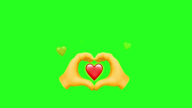 Hands forming a heart emoji shape with floating heart emojis on a green screen background, symbolizing love and affection.