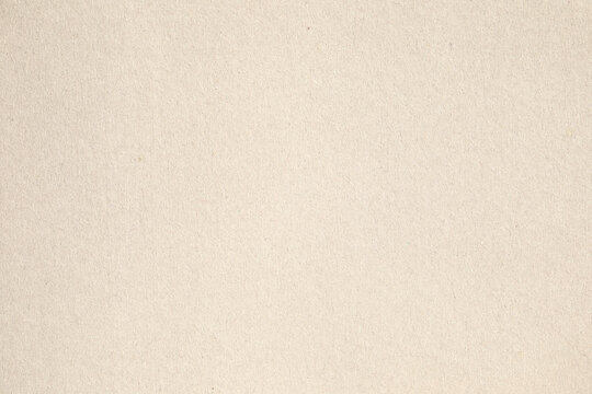 Beige kraft paper texture with fiber speck details