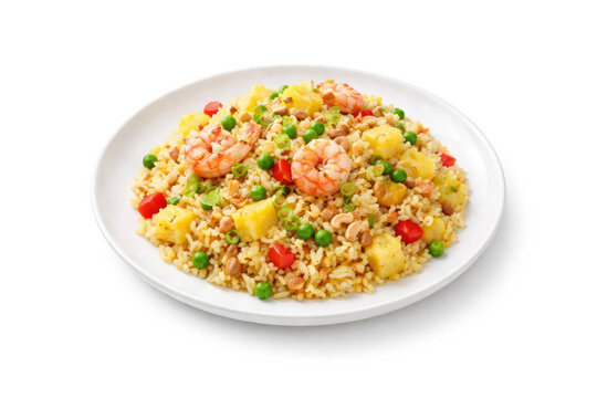 A plate of shrimp fried rice with pineapple and peas is presented on a white surface.