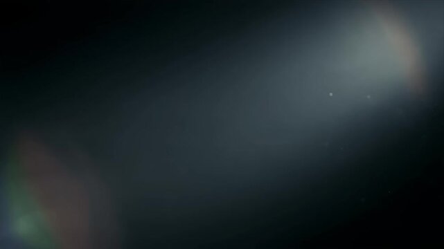 Glowing comet tail drifting across dark starry space.