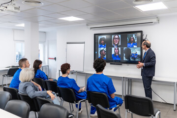 Fototapeta premium Medical students learning remotely during online classroom videoconference