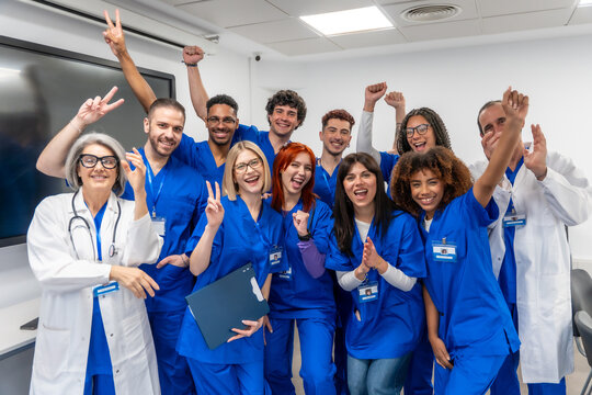 Medical team celebrating success and triumph in hospital