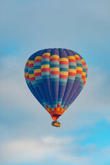 Fototapeta premium Colorful hot air balloons flying above Nevsehir Cappadocia fairy chimneys
