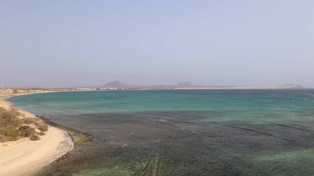 Aerial view of sal rei with its beaches and buildings on a sunny day, Boa Vista island, Cape Verde.
