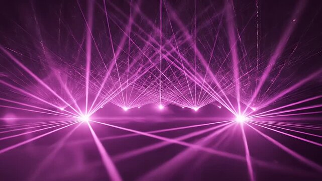 Pink laser beams illuminate a smoky atmosphere, creating geometric shapes and a glow