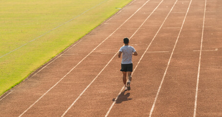 Fototapeta premium Runner training on outdoor track pushing limits Fitness and determination for success