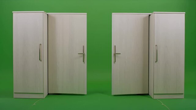 Twin beige cabinets opening on green screen background.
