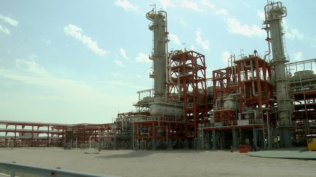 Driving through a gas plant at Asalouyeh, Iran. Asalouyeh is the onshore location for the phased development of Iranian part of Pars gas field, the largest gas field in the world