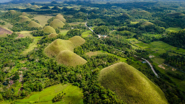 The Chocolate Hills are a geological formation in the Philippine province of Bohol aerial drone destination travel