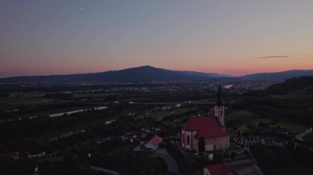 Gorca - Marijina cerkev v Malečniku - magical church near Maribor, Slovenia during sunset, Drone footage