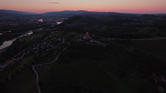 Gorca - Marijina cerkev v Malečniku - magical church near Maribor, Slovenia during sunset, Drone footage