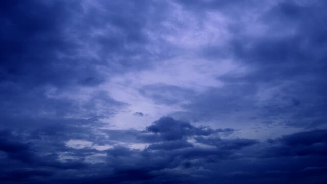 Dramatic Dark Blue Evening Sky with Heavy Clouds