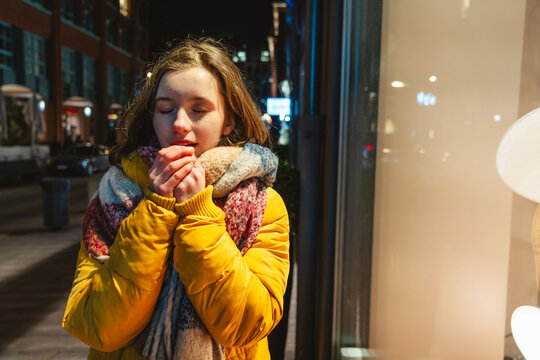 Urban winter evening with warmth and cold contrast outdoors