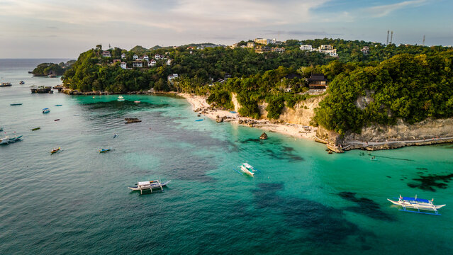 Aerial view  Boracay, Philippines. Crystal clear turquoise waters, white sand, and luxury resorts along the tropical coastline
