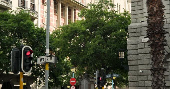 Traffic light is switching red to green while cycle is changing at WALE ST, signaling vehicles