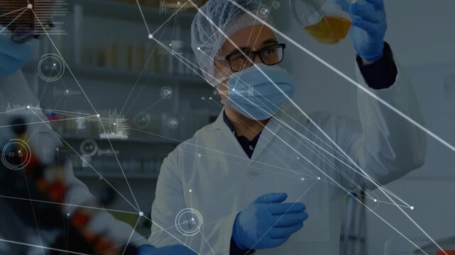 Male researcher raising conical flask as lab peer pointing, testing amber fluid with HUD overlay