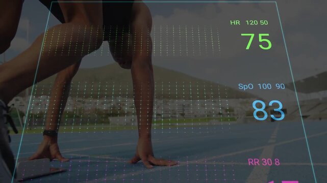 Male sprinter pushing blocks, sprinting on track while holo health overlay tracking HR SpO RR