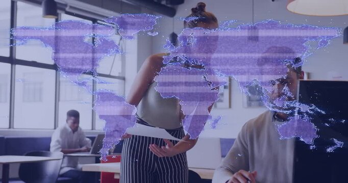 Vertical video: Handing paper, aide in sleeveless top pointing as purple map appearing, reviewing