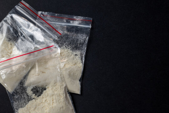 Illegal drug powder in multiple plastic bags