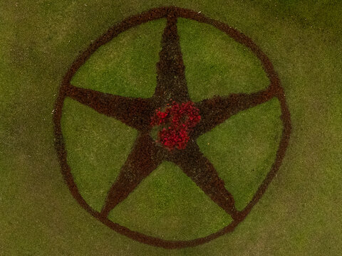 Aerial view of a large star inside a circle with red flowers in the center, Cinchona, Alajuela Province, Costa Rica.