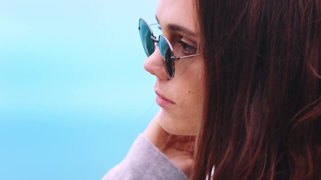 Thinking, sky or woman outdoor with sunglasses, memory or fresh air on weekend break. Wind, space or person outside with eyewear, reflection mindset or peaceful perspective with holiday mindfulness.