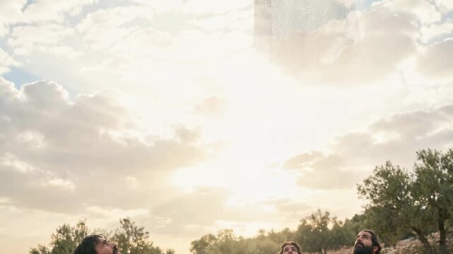 Prophet preaching to group of men in biblical landscape. Spiritual leader teaching followers outdoors under sky. Christian scene depicting ministry of Jesus Christ.