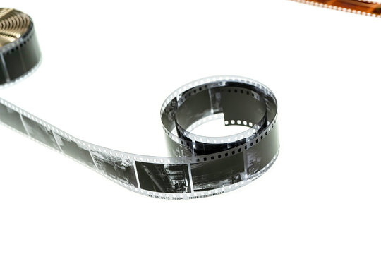 A detailed black and white film negative strip stretched out with visible images.