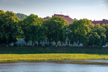 long embankment of the river Uzh in morning light. wonderful urban landscape in early summertime....