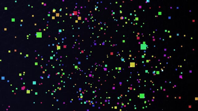 Colorful shapes move across a dark background showing changing patterns and designs in vibrant hues