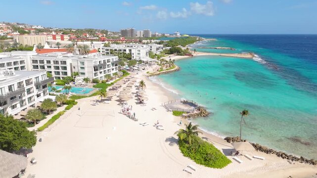 Aerial drone footage of tropical Caribbean coast and turquoise sea near Marriott Beach and Parasasa Beach in Curacao
