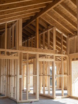 Interior detail of a wooden house under construction using the light frame system