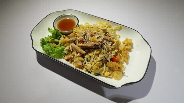 Chinese Stir Fried Fish Maw with Crab Meat The menu is both street food and restaurant food in Thailand. It is very popular for both Thai people and tourists